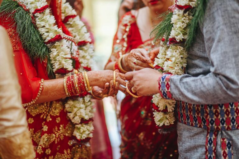 False promise of marriage: 'BNS की धारा 69 धोखा देने की सजा देती है, दिल टूटने की नहीं'…शादी के झूठे वादे पर फैसला 1 close up on hands of man and woman during a traditional wedding ceremony